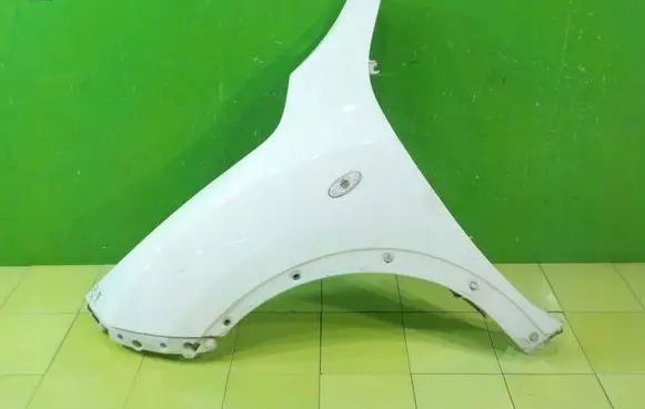Nissan Juke I F15 Fender PRZOD LEWY