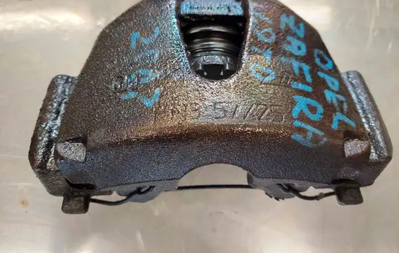 Opel Zafira B Front brake caliper 5725 FN35728
