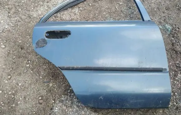 Mitsubishi Carisma Rear door melynos