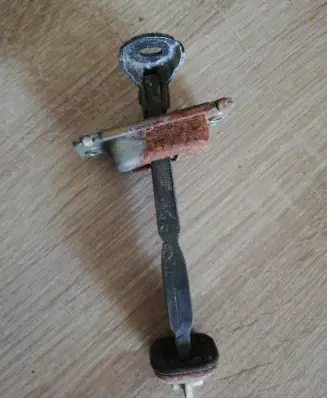 Mazda 6 Rear door check strap stopper