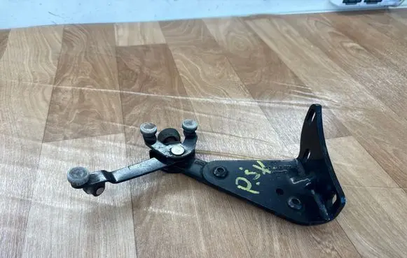 Volkswagen Multivan T5 Sliding door lower roller guide/hinge 7H0843398