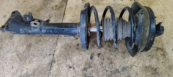 Front shock absorber with coil spring