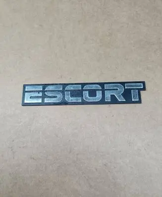 Ford Escort Manufacturers badge/model letters 