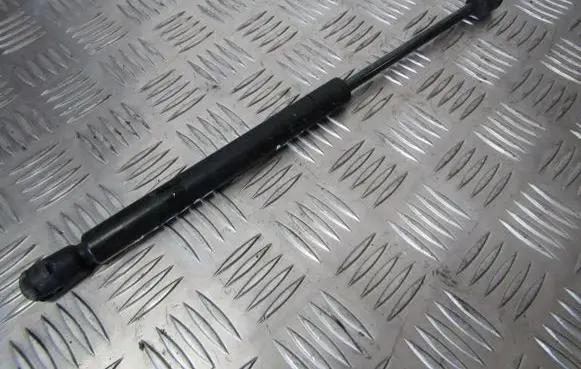 KIA Sedona Front bonnet/hood damper/strut BKK500010