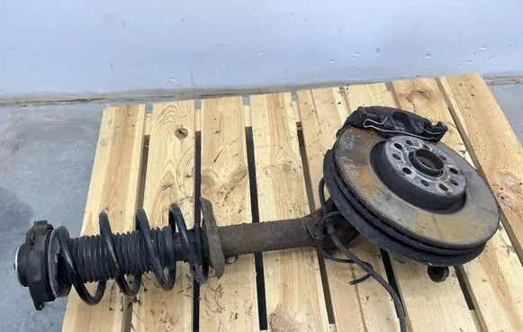 Volkswagen Tiguan Front shock absorber with coil spring MMAUTKO18560