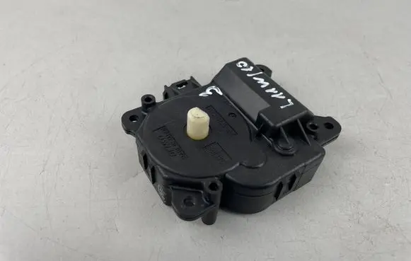 Subaru Legacy Air flap motor/actuator 0638001930