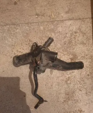Thermostat/thermostat housing