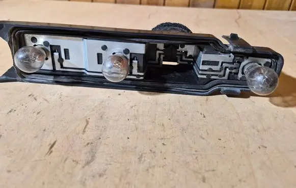 Ford Focus Tail light bulb cover holder 13N004