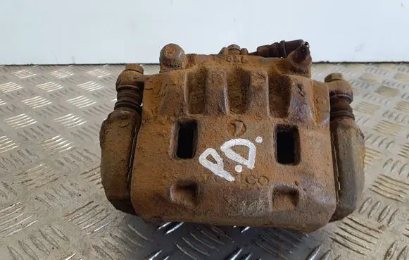 Subaru Impreza III Front brake caliper