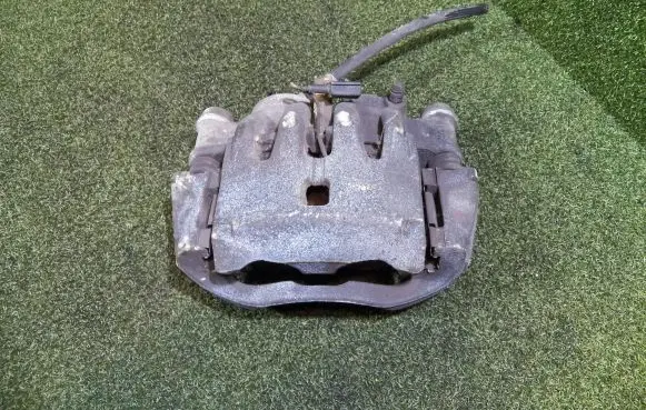 Peugeot Boxer Front brake caliper 1607876880