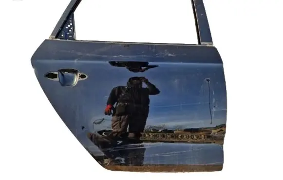KIA Carens III Rear door