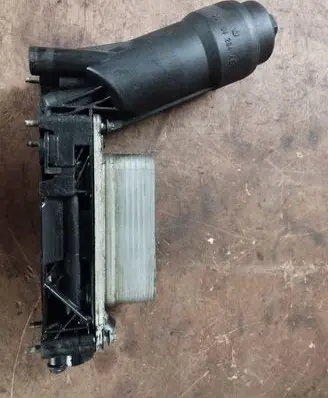 Chrysler Town u0026 Country V Oil filter mounting bracket 05184294AE