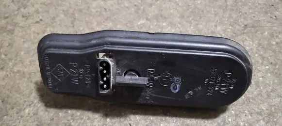 Tail light bulb cover holder