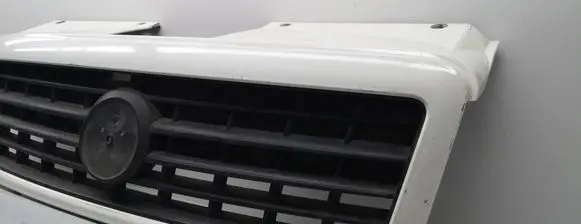 Fiat Doblo Front bumper upper radiator grill 735395576