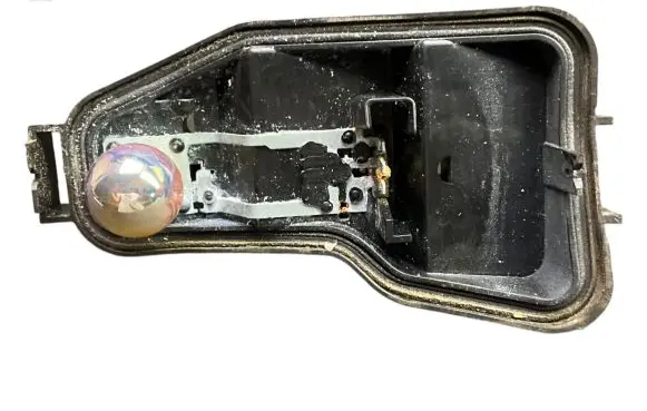 Tail light bulb cover holder