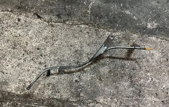 Oil level dip stick