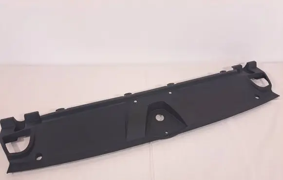 Engine bonnet/hood lock trim molding