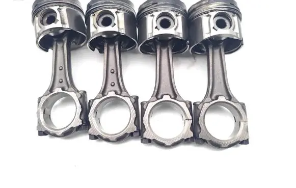Opel Astra H Piston with connecting rod 