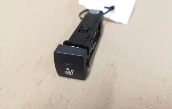 Seat heating switch