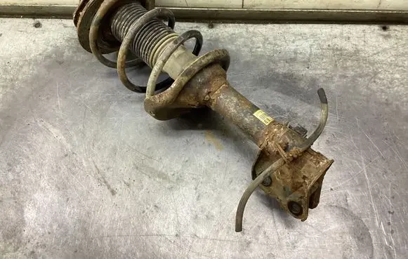 Front shock absorber with coil spring