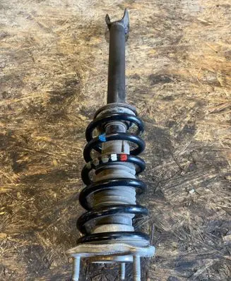 Front shock absorber with coil spring