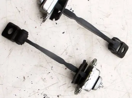 Skoda Octavia Mk2 (1Z) Front door check strap stopper 