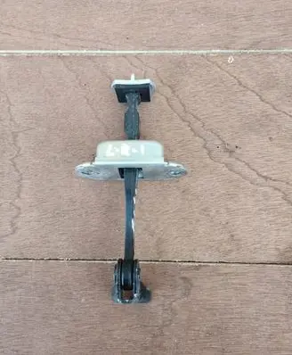 Infiniti EX Front door check strap stopper