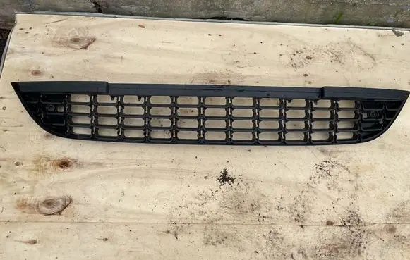 Opel Astra J Front bumper lower grill 13266567