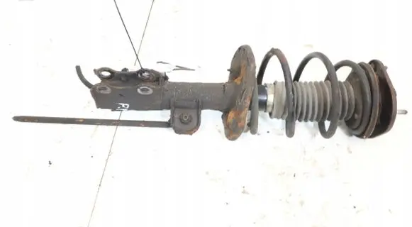 Toyota Corolla E140 E150 Front shock absorber with coil spring 48510-12B40