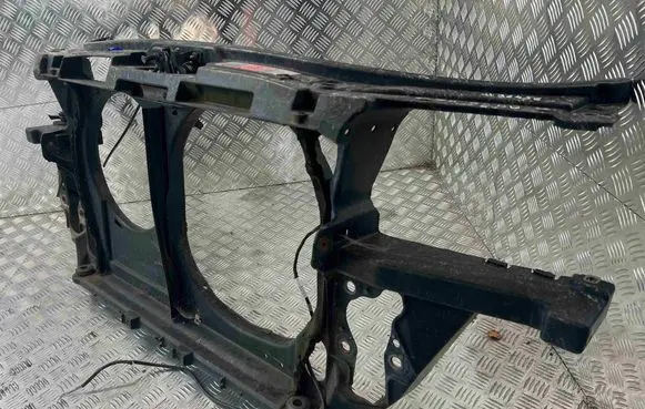Radiator support slam panel