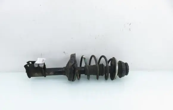 Renault Thalia I Front shock absorber with coil spring 