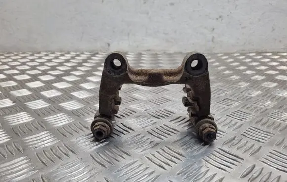 Volkswagen PASSAT B6 Brake caliper pad carrier rear 