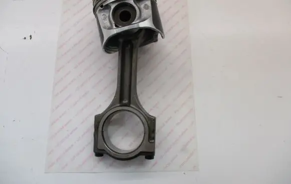 Piston with connecting rod