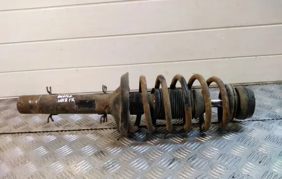Volkswagen New Beetle Front shock absorber with coil spring