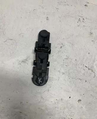 Tail light bulb cover holder