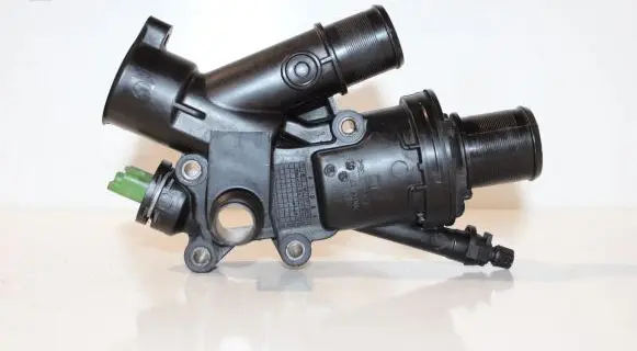 Thermostat/thermostat housing