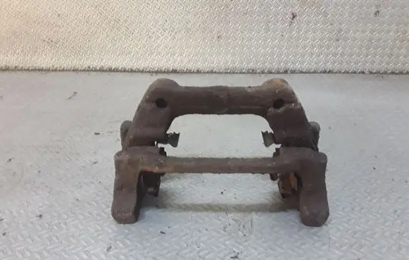 Toyota Avensis T270 Brake caliper pad carrier rear 