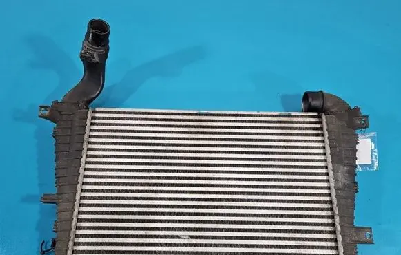 Opel Zafira B Intercooler radiator 13223395 IMPRK1595589