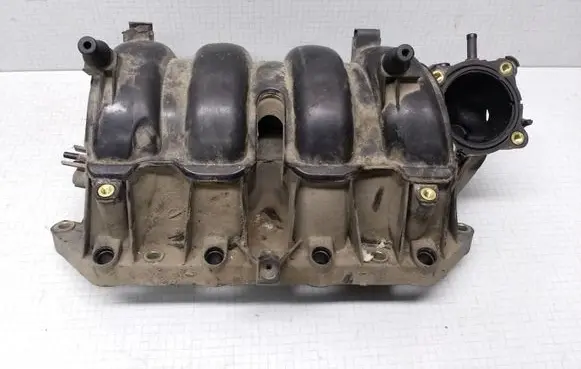 Volkswagen Golf IV Intake manifold 036129711
