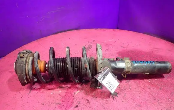 Volkswagen Polo IV 9N3 Front shock absorber with coil spring