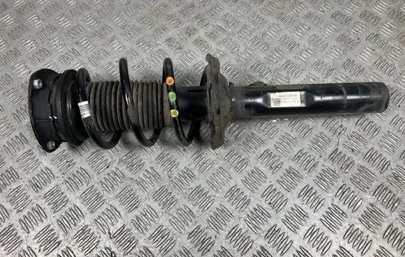 Volkswagen PASSAT B9 Front shock absorber with coil spring 3WA413031AG
