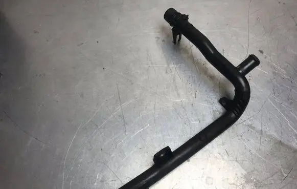 Volkswagen PASSAT B7 Engine coolant pipe/hose 03L121065AJ