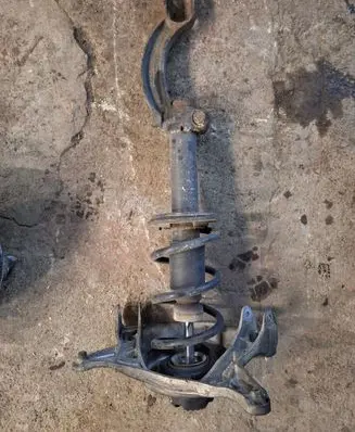 Front shock absorber with coil spring
