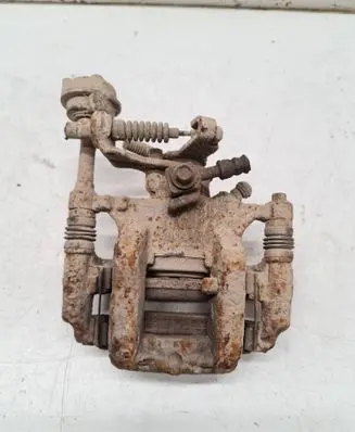 Opel Astra J Rear brake caliper 