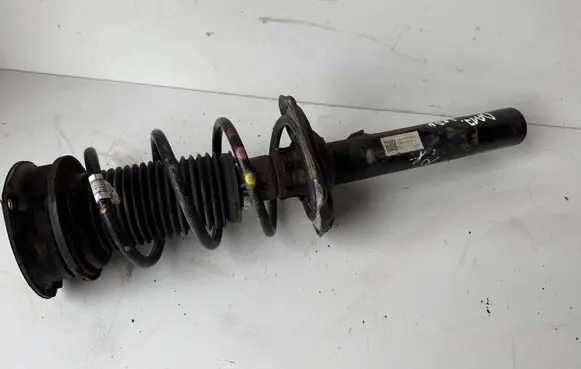 Seat Leon (5F) Front shock absorber with coil spring 5Q0413023FP
