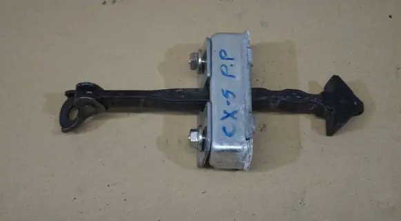Mazda CX-5 Front door check strap stopper 