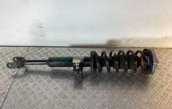 Front shock absorber with coil spring