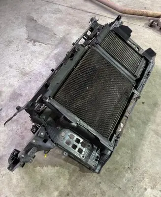 Radiator support slam panel