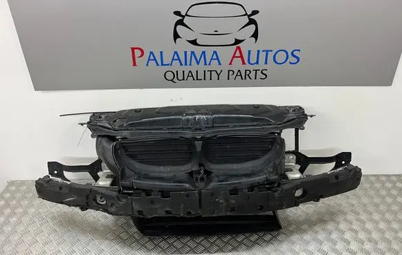 Radiator support slam panel