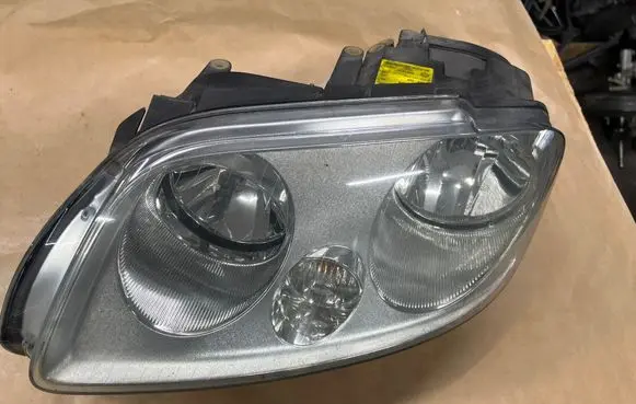 Volkswagen Touran I Headlight/headlamp 2K0941005B 20011002A 4VEX13006AF